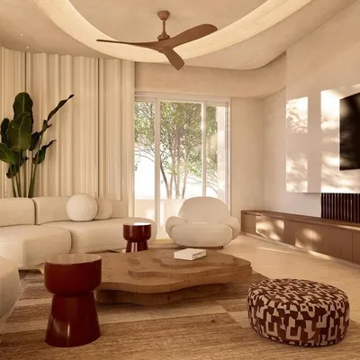 The main living area of Kumo House, designed as a tranquil gathering space. The design emphasizes natural materials and a soft, earthy color scheme to create an atmosphere of warm minimalism.