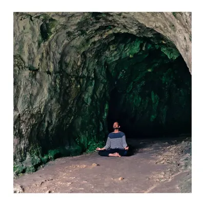 A moment of meditation in a quiet cave. The outer world fades away, and all that remains is the inner experience. This is the goal of yoga.