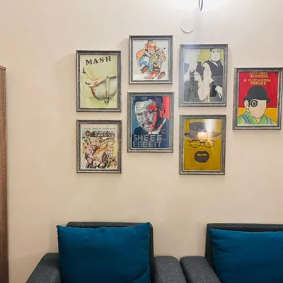The final result of a commissioned gallery wall for a client who loves classic TV and movies. This collection features pieces inspired by MASH, Breaking Bad, Asterix & Obelix, and more.