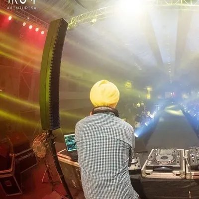 A view from behind my console at a large-scale fashion show. The effort I put into preparation is directly proportional to the results you see on the dance floor.