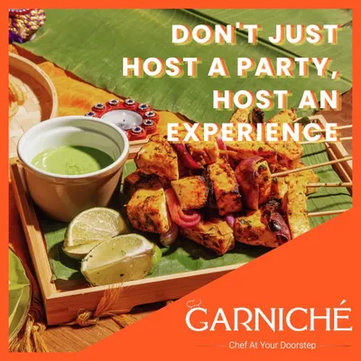 A perfect party starter. These paneer tikkas are marinated in spices and grilled fresh at your home, served on a banana leaf for an authentic touch. It's a true sensory experience.