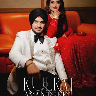 A stylish, magazine-cover-style shot of the couple at their reception. This photo is all about attitude, elegance, and celebrating their new life together.