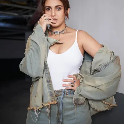 A closer look at the raw, grunge moment we styled with Huma Qureshi. The distressed denim co-ord from Huemn, paired with a silver choker, is all about that edgy, off-duty vibe.
