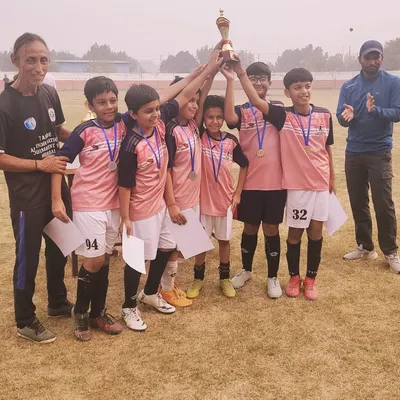 Our Under-11 team proudly lifts the championship trophy after a hard-fought intra-academy tournament. Moments like these build confidence and team spirit.