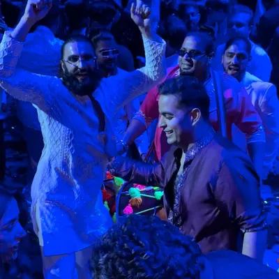 Sangeet night turned into a full-on Bollywood set with Ranveer Singh. We were thrilled to match his incredible energy and rule the vibe together.