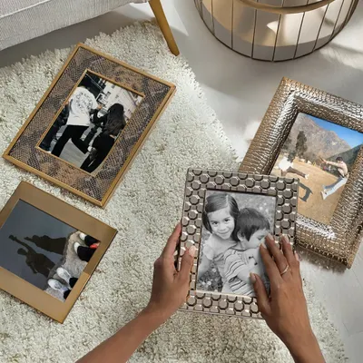 This Rakhi, frame the moments that make your bond priceless. My collection of photo frames, with varied textures from snakeskin to hammered silver, offers a beautiful way to cherish your memories.