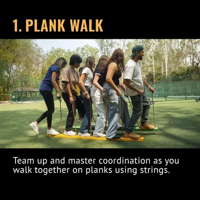 This is the Plank Walk, a new team-building game. Your team has to master coordination to walk together on planks using only strings. It's harder than it looks!