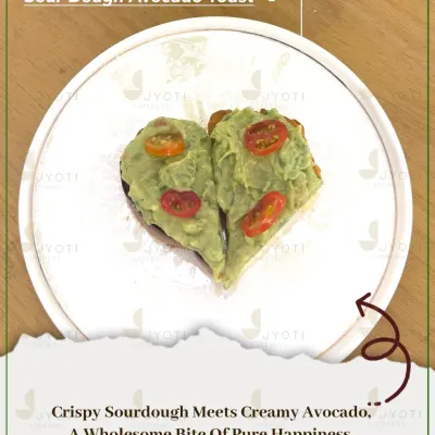 A wholesome bite of pure happiness. This Sourdough Avocado Toast is shaped like a heart, combining crispy bread with creamy avocado and fresh cherry tomatoes.