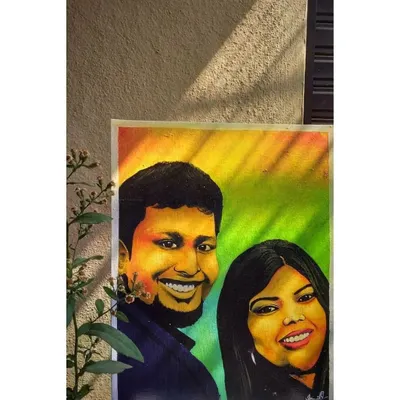 A vibrant and expressive painted portrait of a couple. This custom artwork was created to celebrate their bond, using a warm and colorful palette to reflect their personalities. It's a perfect example of a personalized anniversary or wedding gift.