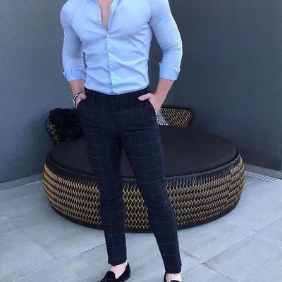 A great example of a smart casual look with a tailored light blue formal shirt and dark checked trousers. I can create custom trousers and shirts that fit you perfectly.