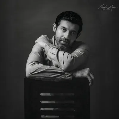 A classic, character-driven portrait. This black and white shot has a timeless feel and is great for roles that require a more serious or dramatic presence.