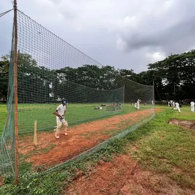 A typical evening at our outdoor nets in Kharghar. This is where players face different challenges, learning to play on a natural turf wicket under the open sky, which is crucial for match temperament.