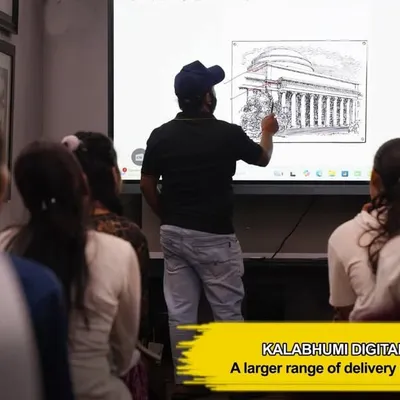 An instructor uses our digital smartboard to teach architectural perspective, a fundamental skill for any aspiring artist or designer.