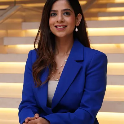 A close-up portrait showcasing a confident and professional look. I believe that an emcee's presence begins with their expression: approachable, confident, and ready to connect with the audience.