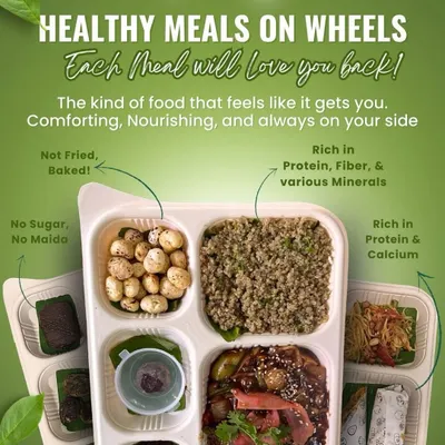 Our 'Meals on Wheels' graphic shows you exactly what to expect: comforting, nourishing food that is never fried and contains no sugar or maida. It's rich in protein, fiber, and minerals, designed to make healthy eating simple and enjoyable.