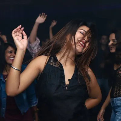 This is the result of a great set: a packed dance floor with everyone lost in the music. This photo from my "Saturday Filmy Kahani" night at Marquis by Radisson Blu shows the kind of vibrant, carefree atmosphere I create.