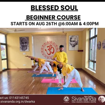 A snapshot from our beginner course, where an instructor guides students in Trikonasana (Triangle Pose). We emphasize correct form to build a strong and safe foundation for your yoga journey.