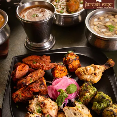 This is love wafting in rich, Punjabi aromas. Our spread of kebabs, curries, and dal is perfect for a group of hungry foodies.