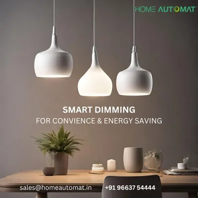 We use smart dimming technology in our lighting designs, like these pendant lights over a dining table. This feature not only adds convenience but also significantly reduces energy consumption by allowing you to use only the light you need.