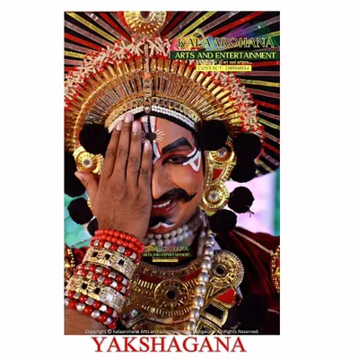 The expressive power of a Yakshagana artist is captured in this moment. The detailed face paint and intense gaze are central to conveying the story and character's emotions, a hallmark of our authentic performances.
