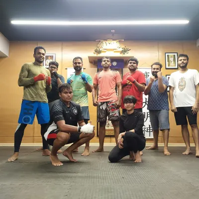 The energy after a great MMA class. This group of dedicated students just finished a tough session of striking and grappling drills. This is where friendships are forged and limits are broken.