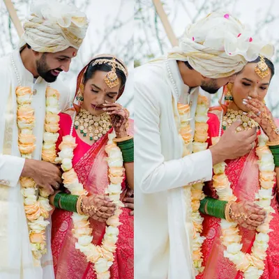 A groom gently wipes away his bride's tears of joy during the ceremony. These are the unscripted, deeply emotional moments that we feel privileged to capture.