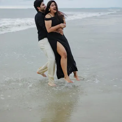 The pure joy of being together on a beach in Goa. I encourage my couples to play, laugh, and forget I'm even there.