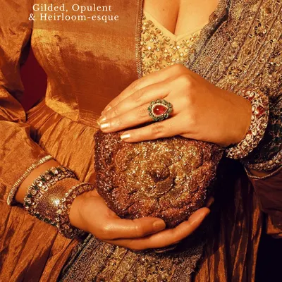 Bags are the new IT accessories. This gilded, opulent, and heirloom-esque potli from Doux Amour is perfect for a bride who loves a touch of vintage luxury.