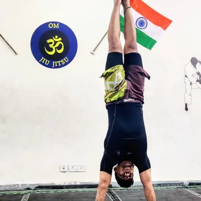 A simple handstand is a powerful tool for developing shoulder strength, balance, and spatial awareness. We incorporate bodyweight exercises like this to build a strong, capable foundation.