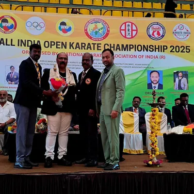 Being felicitated at the All India Open Karate Championship in Mysore. It is an honor to be recognized by the national karate community.