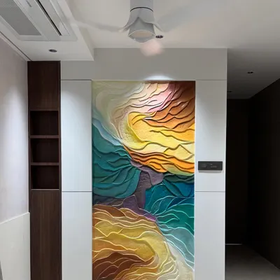 The abstract wave mural installed in a residential space. This full view shows how the artwork functions as a massive, colorful painting that completely transforms the wall.