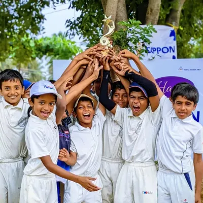 The unforgettable moment of hoisting the championship trophy. This is the culmination of hard work, dedication, and incredible teamwork from our U-10 champions.