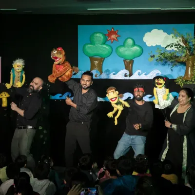 The talented puppeteers behind 'The Monkey & The Crocodile' take a bow with their creations. This show, from the team behind 'Galli Galli Sim Sim', brings a classic Panchatantra tale to life with vibrant hand puppets.