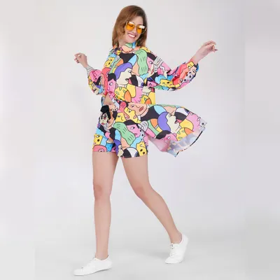 A dynamic shot of a model in a colorful, patterned co-ord set. We capture movement and energy to make fun, youthful apparel feel alive and exciting for online shoppers.