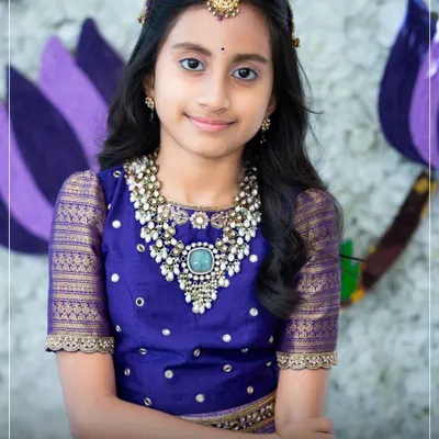 A treasured moment from our client diaries. This young lady is adorned in a bespoke royal blue and gold lehenga, showcasing the rich embroidery and traditional elegance I offer for more formal events.