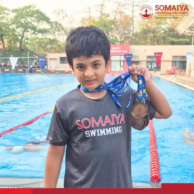 Young swimmer Vrishin Hingwala proudly displays his four bronze medals won at the U-9 ISSO Mumbai Regional Games.