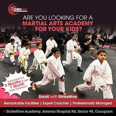 Are you looking for a martial arts academy for your kids? Our program offers expert coaching and remarkable facilities to help your child grow. This image shows our young students during a warm-up lunge.