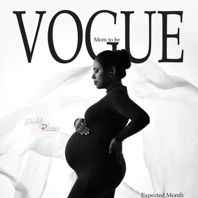 A striking black and white maternity portrait styled as a Vogue magazine cover. The mom-to-be wears a sleek, fitted black dress, creating a look that is both modern and timeless.