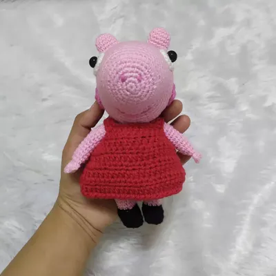 Here is a front view of the custom Peppa Pig toy I made. I focus on getting the details just right, from her red dress to her sweet smile, making her the perfect friend for any Peppa fan.