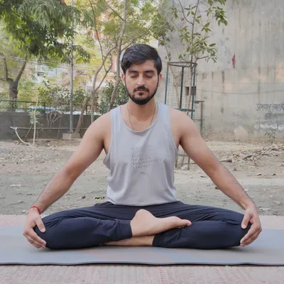 This is Siddhasana, or the Accomplished Pose, which is an excellent posture for meditation. It helps improve alertness of the mind and is beneficial for pubic and reproductive health.