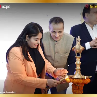 A moment from the grand inauguration ceremony, with dignitaries participating in the traditional lamp lighting to mark an auspicious start.