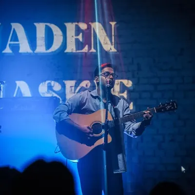 On stage under the lights at antiSOCIAL. Performing live is about creating a special atmosphere and sharing a moment with everyone in the room.