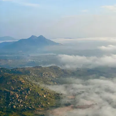 A classic Skandagiri view. On most mornings, you get to stand on the peak and watch the clouds stretch out below you like a vast, white ocean.