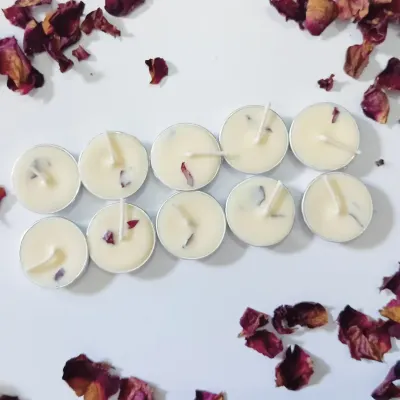 Petals of love and light of joy. This is my pack of ten air-dried rose petal tealights, arranged neatly to show the delicate botanical touch in each one.