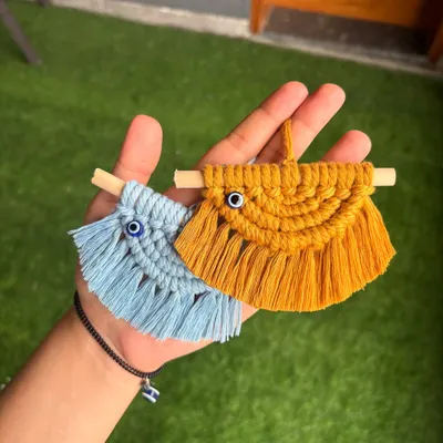 Our semicircle evil eye car charm is a perfect little accessory for your car. It helps keep away buri nazar and adds a touch of boho decor. We can customize it in over 12 colors.