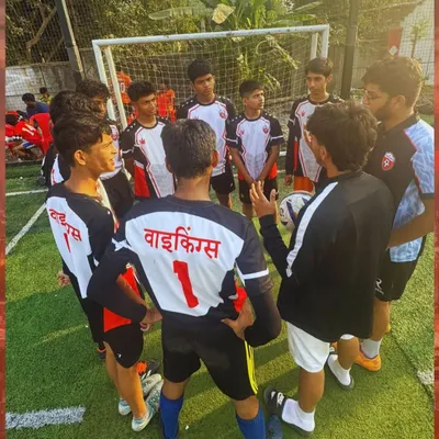 A pre-game huddle where I lay out the strategy. Every player is locked in, focused, and ready to execute the game plan as one unit.