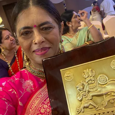 A proud moment for me, holding our first-place award from the Gowda Princess fashion show. This was all about celebrating powerful women.