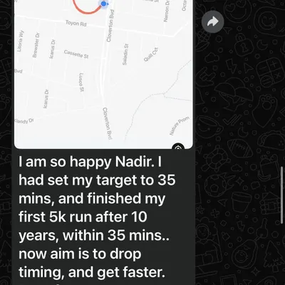 A client's message celebrating a huge personal victory: finishing a 5k run in her target time after 10 years. These are the non-scale victories that matter most.