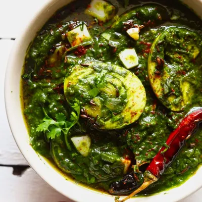 Wholesome comfort in a bowl. My Spinach Egg Curry is where health meets flavor, with boiled eggs simmered in a rich and nutritious spinach gravy. It's perfect with rice or roti.