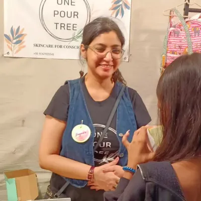 A candid moment of conversation with a customer at the Golden Spiral Fair. These interactions are why I do what I do.